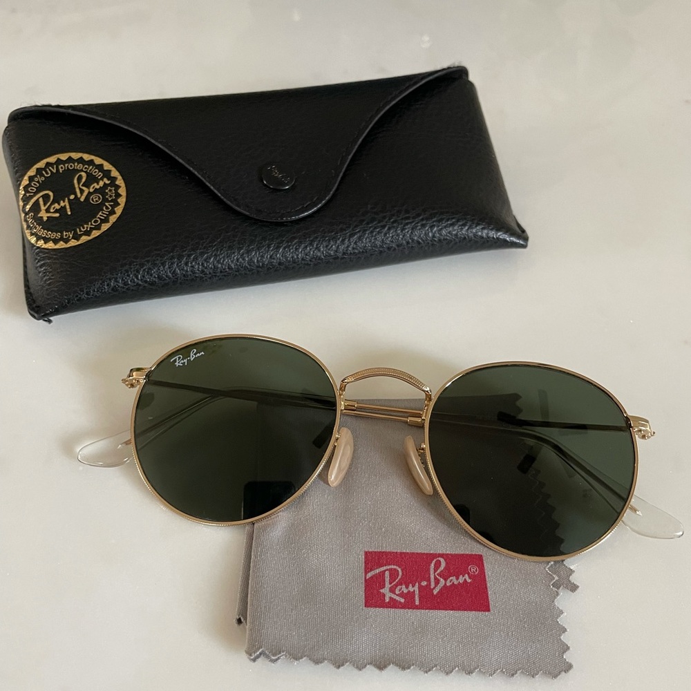Ray-Ban Sunglasses. Round gold metal. Great condition.